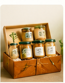 Festive Hampers - A thoughtful mix of treats, plants and seasonal details.
